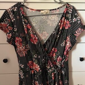 NWOT Floral Jumpsuit- size L